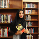 Formin Akter, a Rohingya refugee girl, holds a copy of the novel Jane Eyre, which she says is her new favourite book, inside the library of the Asian University for Women in Chittagong